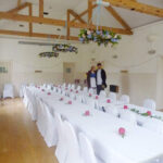 Getting ready for the Mad Hatters tea party at East Dean Village Hall